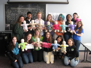 Students show off their handmade therapy dolls for the Medical University of South Carolina Children’s Hospital.