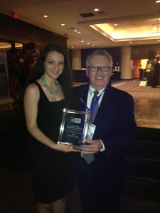 Emily with Professor Ted Clark, after the New Paltz chapter of the American Marketing Association was awarded silver at the AMA International Collegiate Conference