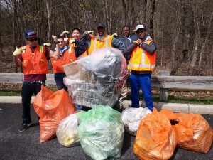 Akeem (third from right) participating in the New Paltz Clean Sweep with the Educational Opportunity Program's Men Valuing Professionalism club